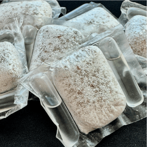 A group of plastic bags of food

AI-generated content may be incorrect.